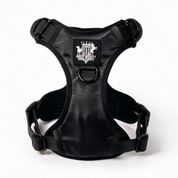 Rogue Royalty support walking  dog harness with adjustable straps, plastic buckles, and a central brand patch reading Rogue Royalty 